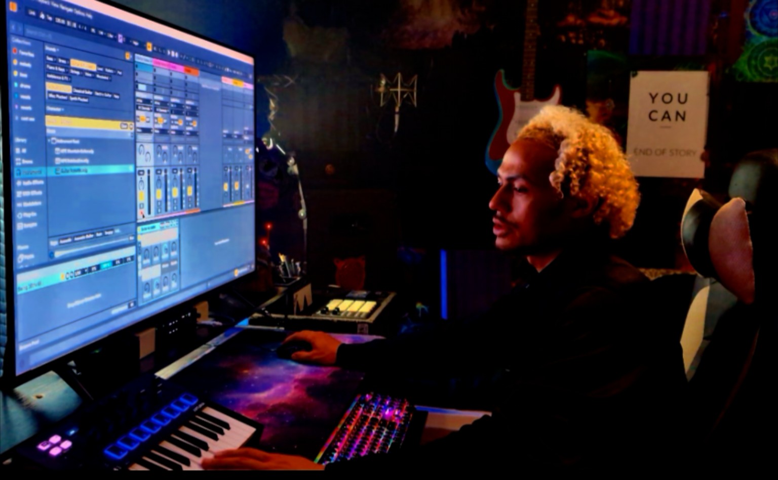Estevaun working at his production desk in Estevaun Studios
